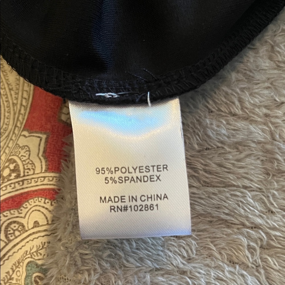 Chic Black Dress With Multicolor Ring Accents - image 6